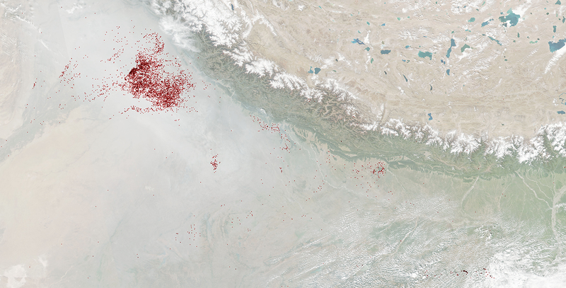 All those red dots are fires burning, captured from NASA satellites October 30 to November 1, 2018.